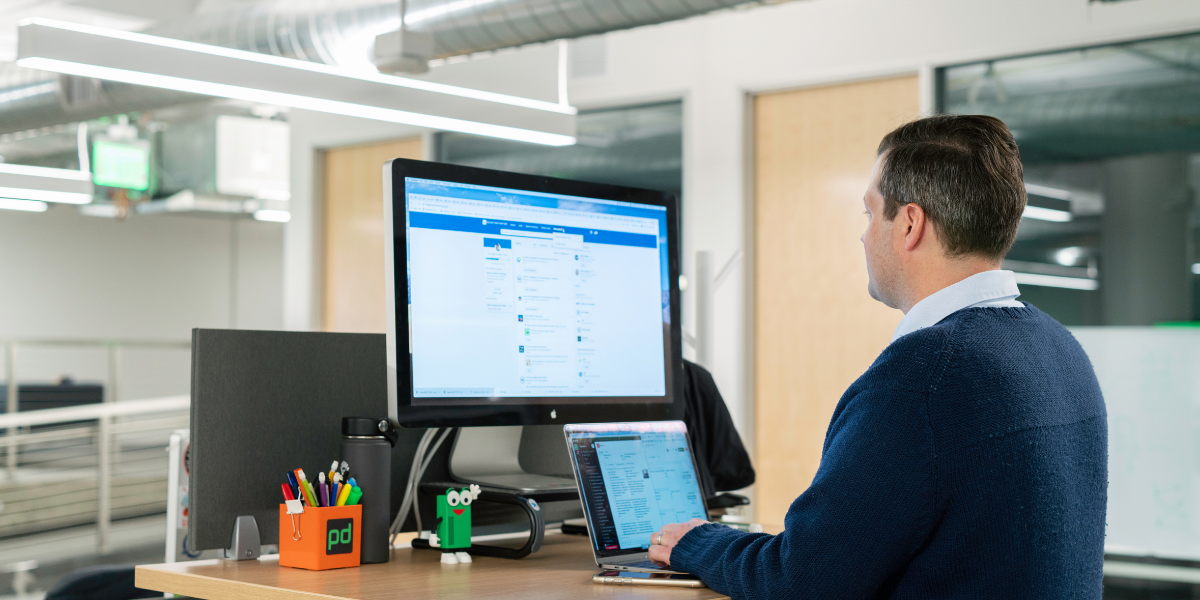 B2B marketer reviewing LinkedIn pipeline metrics instead of vanity engagement on a laptop dashboard
